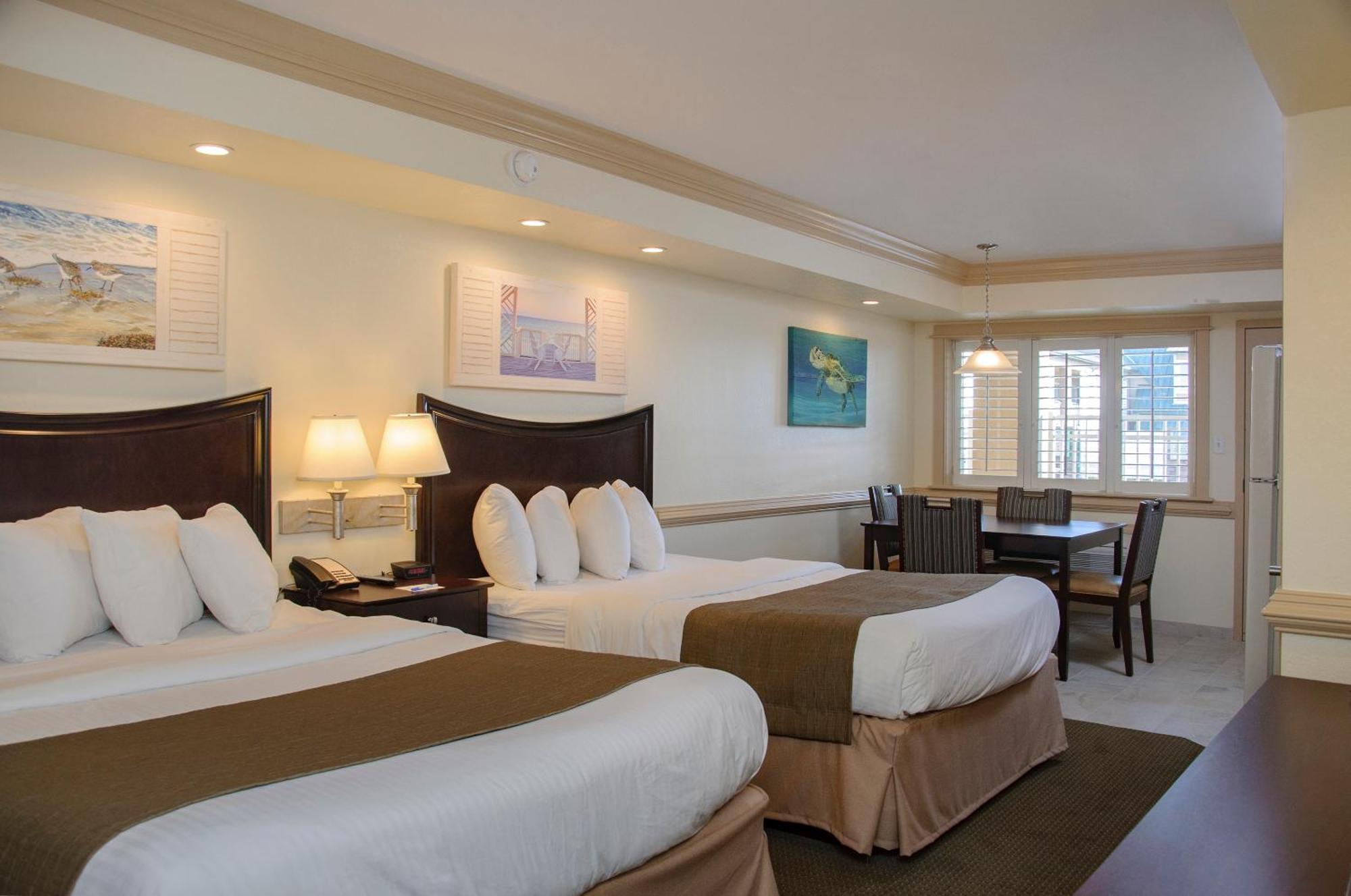 Efficiency with Two Queen Beds - Main Building & Pool View