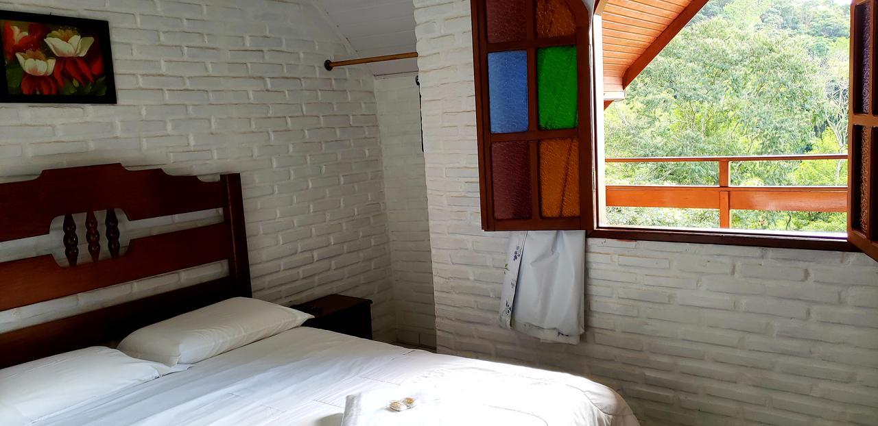 Quarto Quádruplo com Varanda