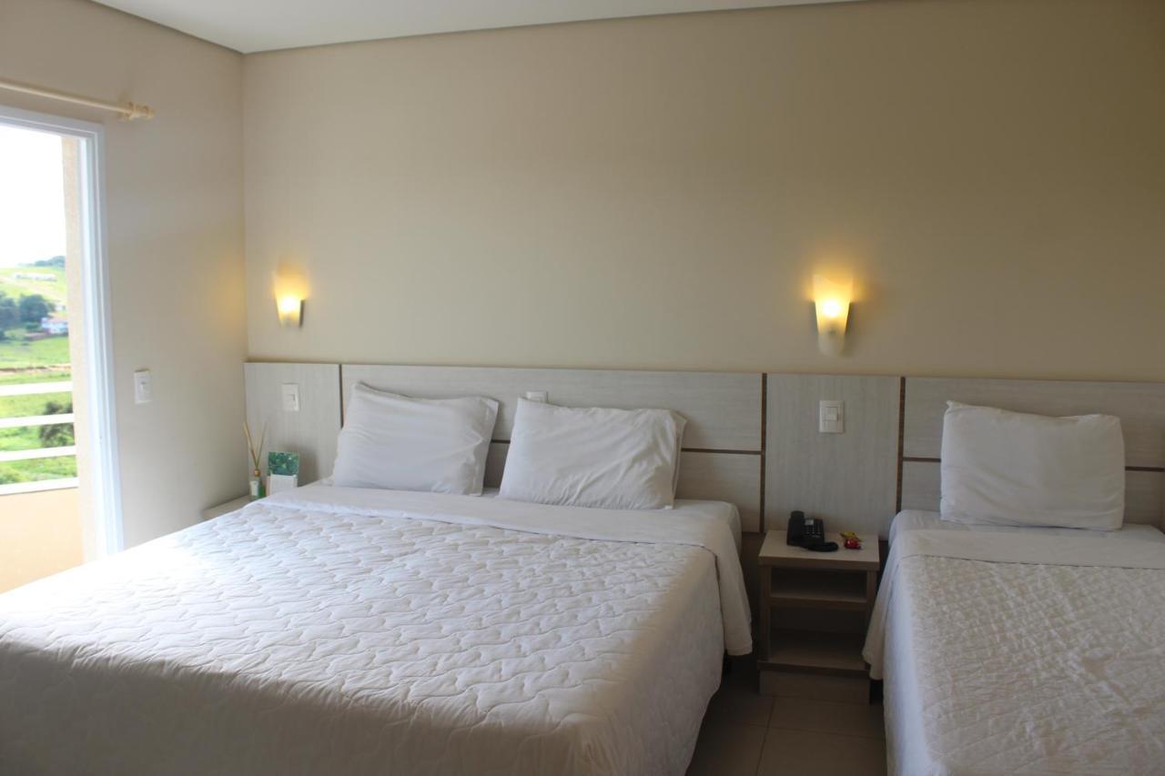 Quarto Triplo com Varanda