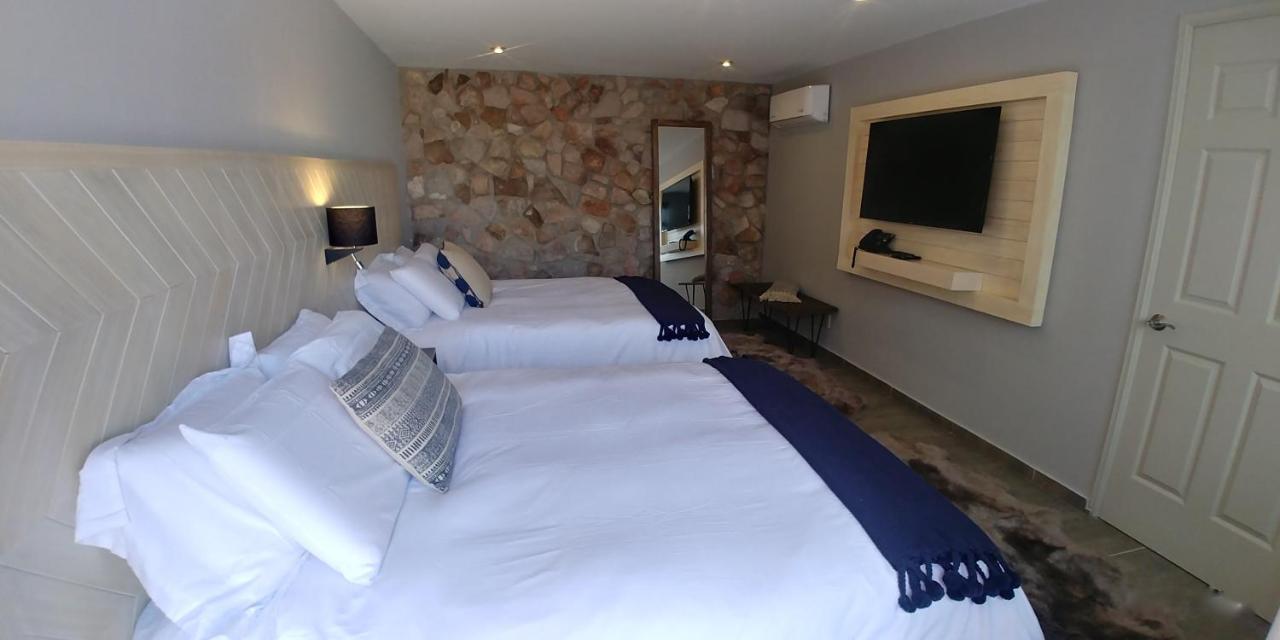 Habitación Doble Deluxe (2 adultos + 1 niño)