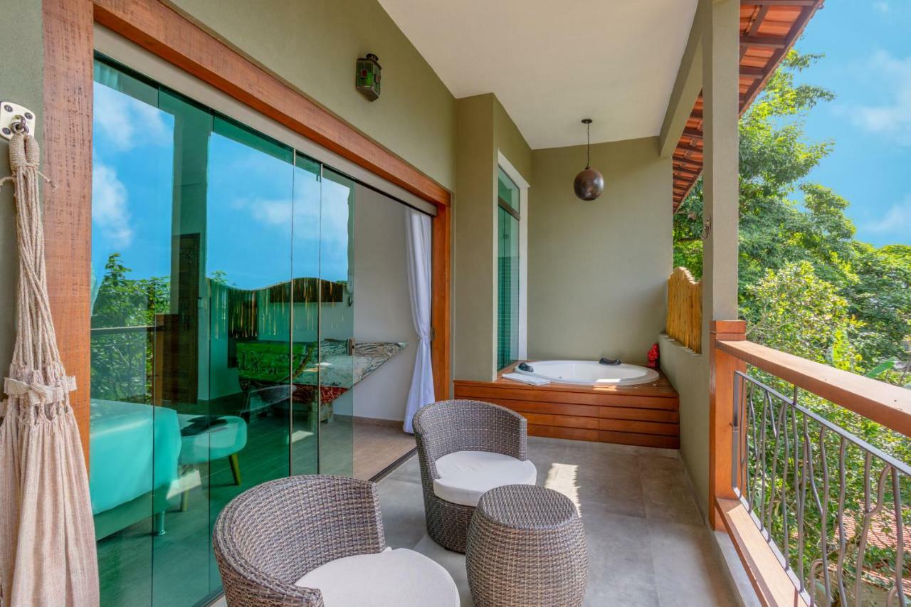 Quarto triplo de luxo com banheira de hidromassagem ao ar livre