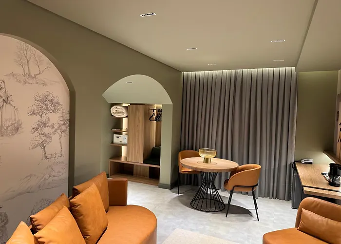 Mogano Premium Hotel - ELETROPOSTO