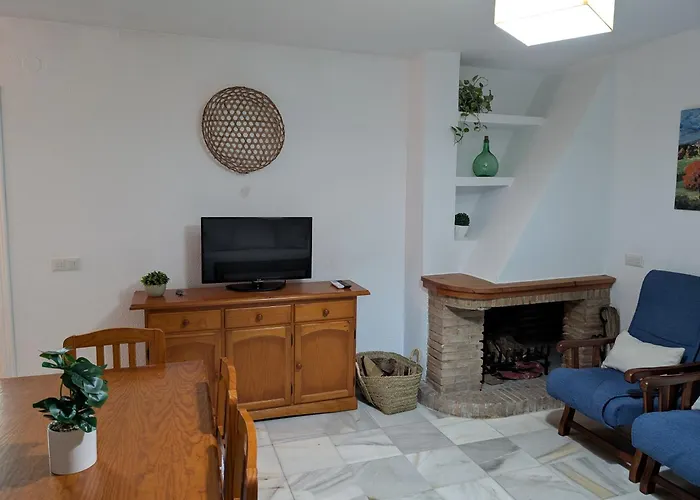 Chalet adosado en Matalascañas con piscina y chimenea, cerca de la playa