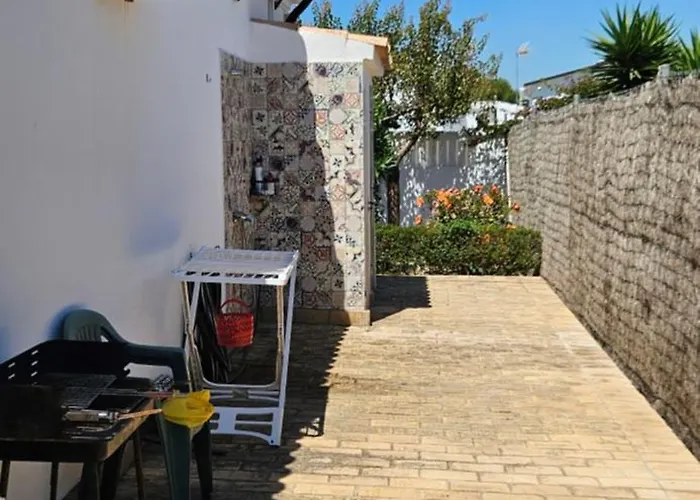 Las Casitas de la Barrosa con jardín y piscina